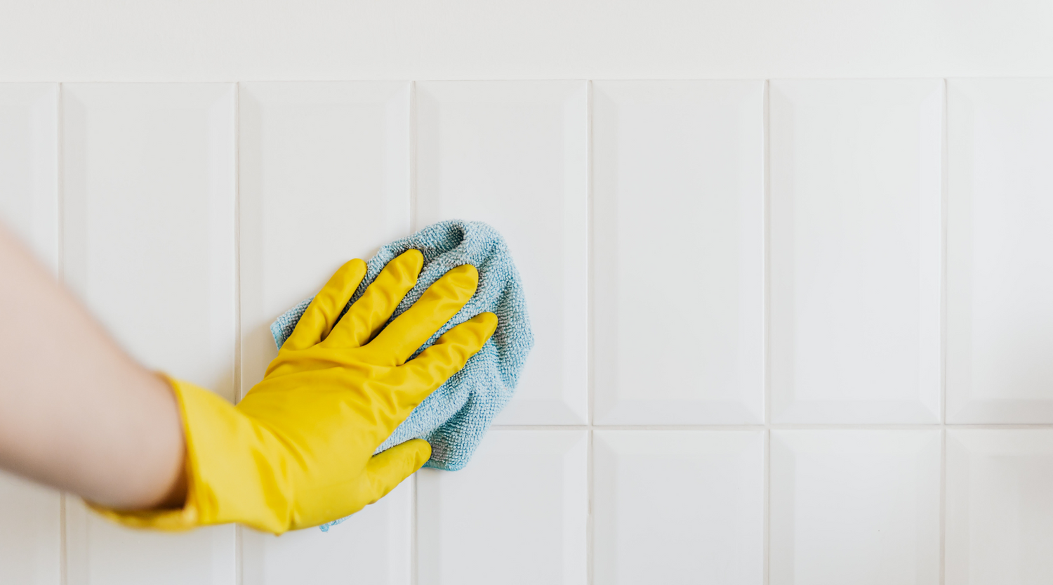 Cleaning a wall to remove dirt and stains for a refreshed look