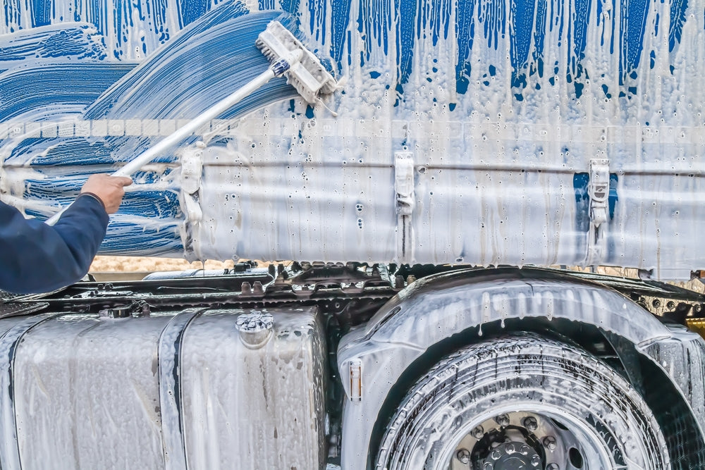 Cleaning process for truck tarpaulins to remove dirt and stains