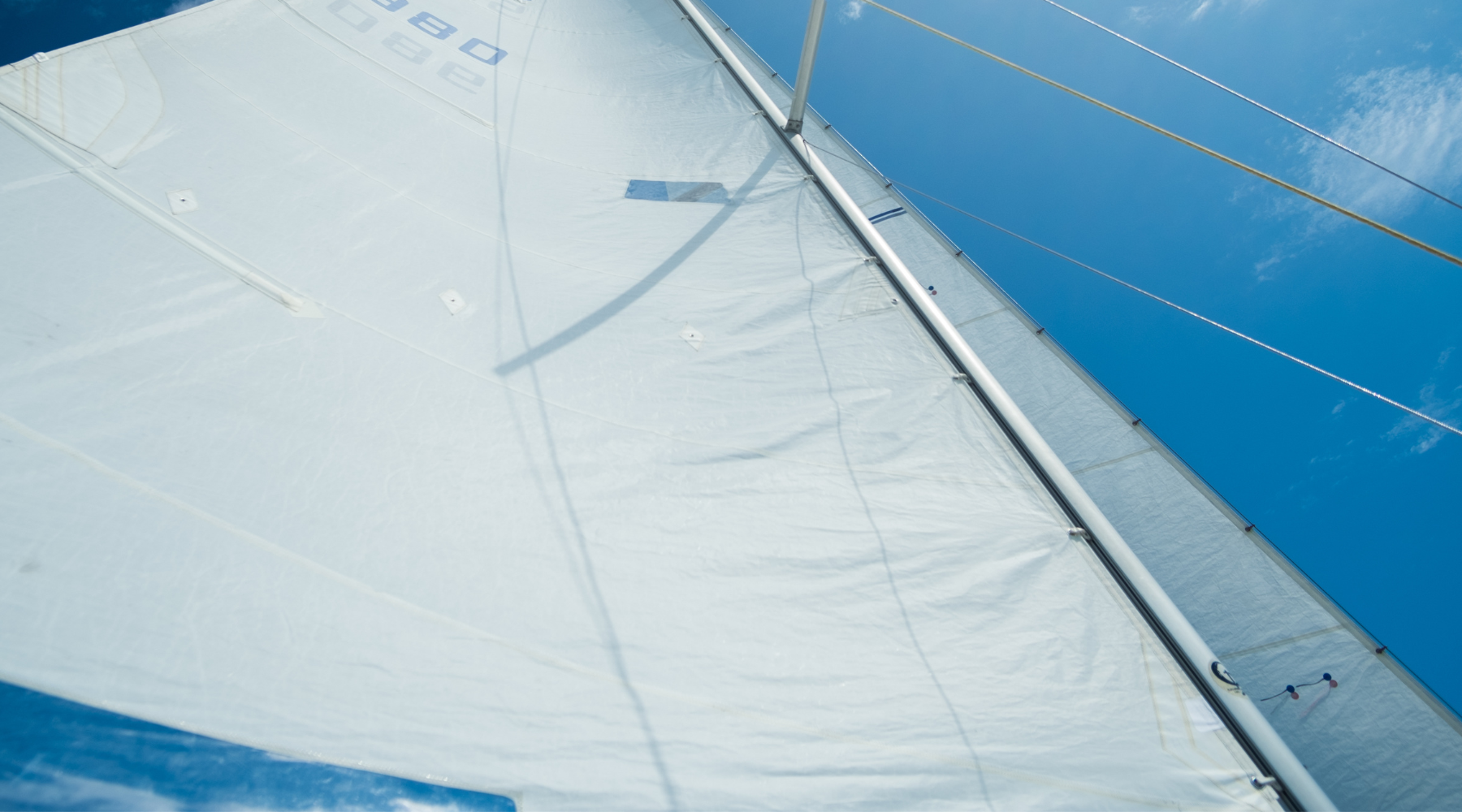 Close-up of a sail showcasing its fabric and stitching details